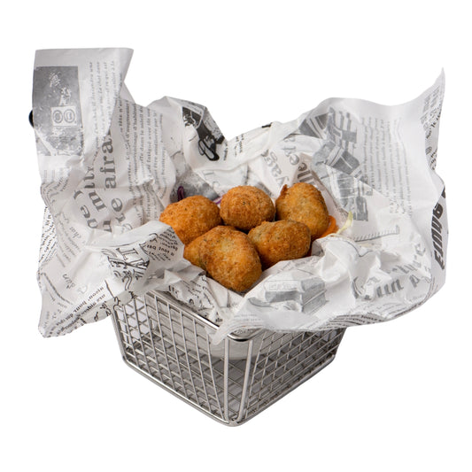A paper-lined basket containing jalapeno poppers on a white background.